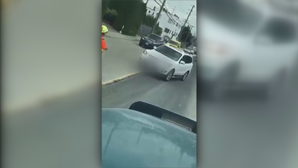 A Burnaby flagger was struck by a white SUV while on the job in June.