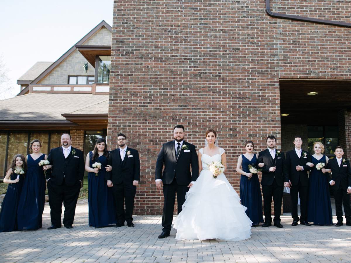Katherine Flemming (second from left) was maid of honour at her friend Natalina's wedding in April. She spent well above the Canadian average for bridesmaids, but apparently, she's in the minority — because it turns out, groomsmen spend more.