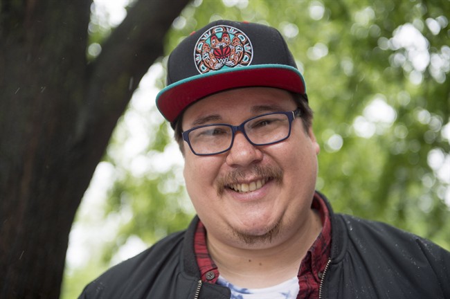 Indigenous poet Jordan Abel is shown during an interview with The Canadian Press in Toronto on Thursday, May 25, 2017. One of the most lucrative prizes in poetry will be handed out at a gala event in Toronto tonight. A long poem about racism and the representation of indigenous peoples from Nisga'a writer Abel is among the three Canadian titles shortlisted for the award. THE CANADIAN PRESS/Frank Gunn.