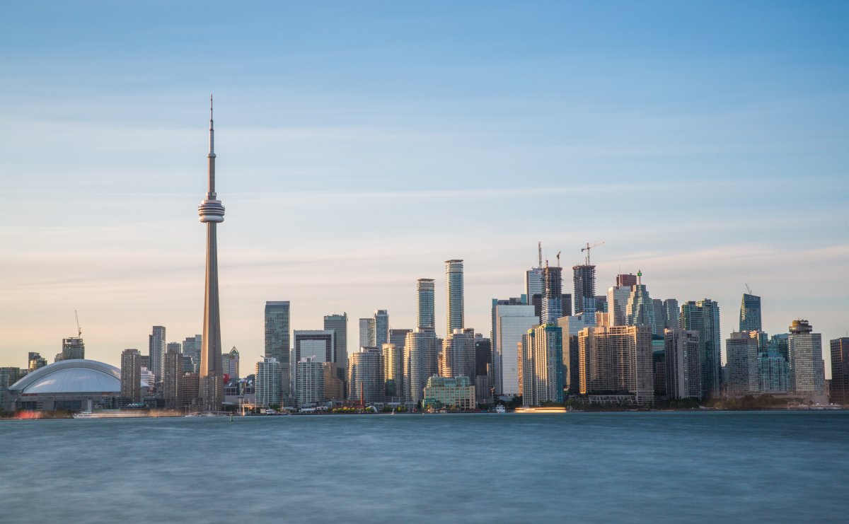 A long exposure shot of the Toronto Skyline off of Lake Ontario.