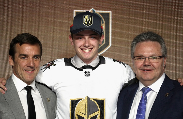 Cody Glass (centre) poses for a picture with Las Vegas Golden Knights general manager George McPhee and assistant general manager Kelly McCrimmon after being chosen sixth overall at the 2017 NHL Draft.