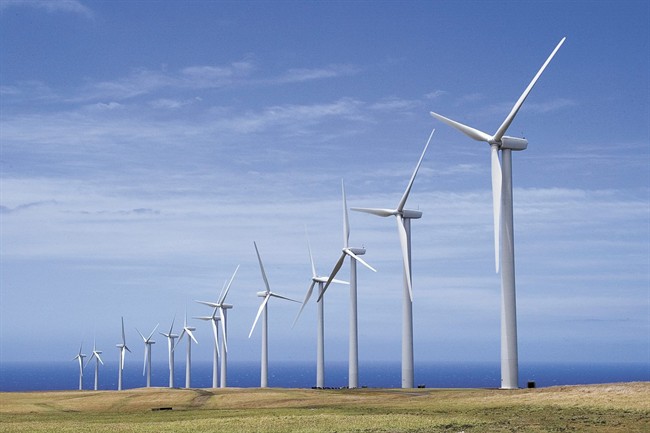FILE - In this July 12, 2007, file photo, General Electric wind turbines, part of the Pakini Nui Wind Farm project are seen in Kailua-kona, Hawaii. 