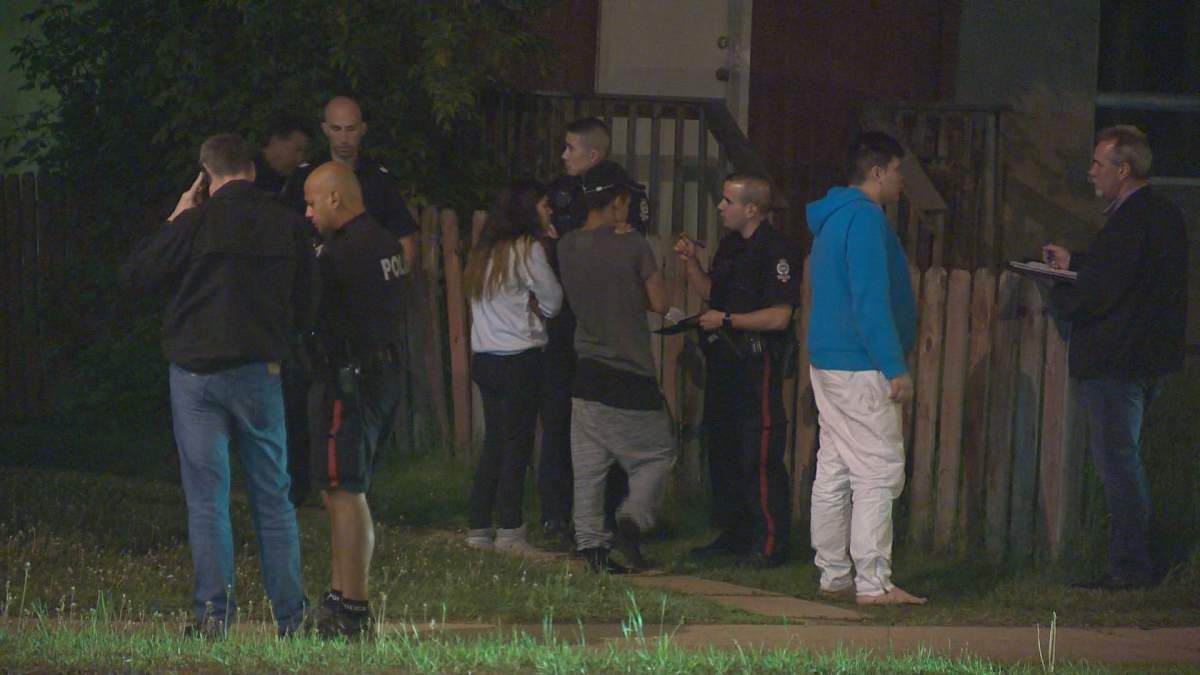 Police interviewing witnesses after a shooting near a Husky gas station just off 66 Street and 132 Avenue in northeast Edmonton. June 1, 2017.