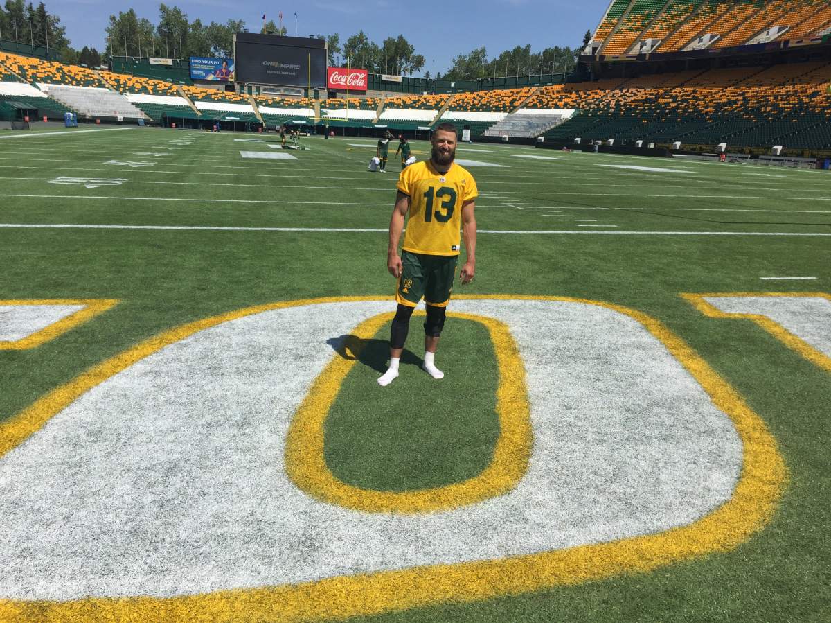 Eskimos quarterback Mike Reilly standing in the end zone following practice on June 7, 2017.