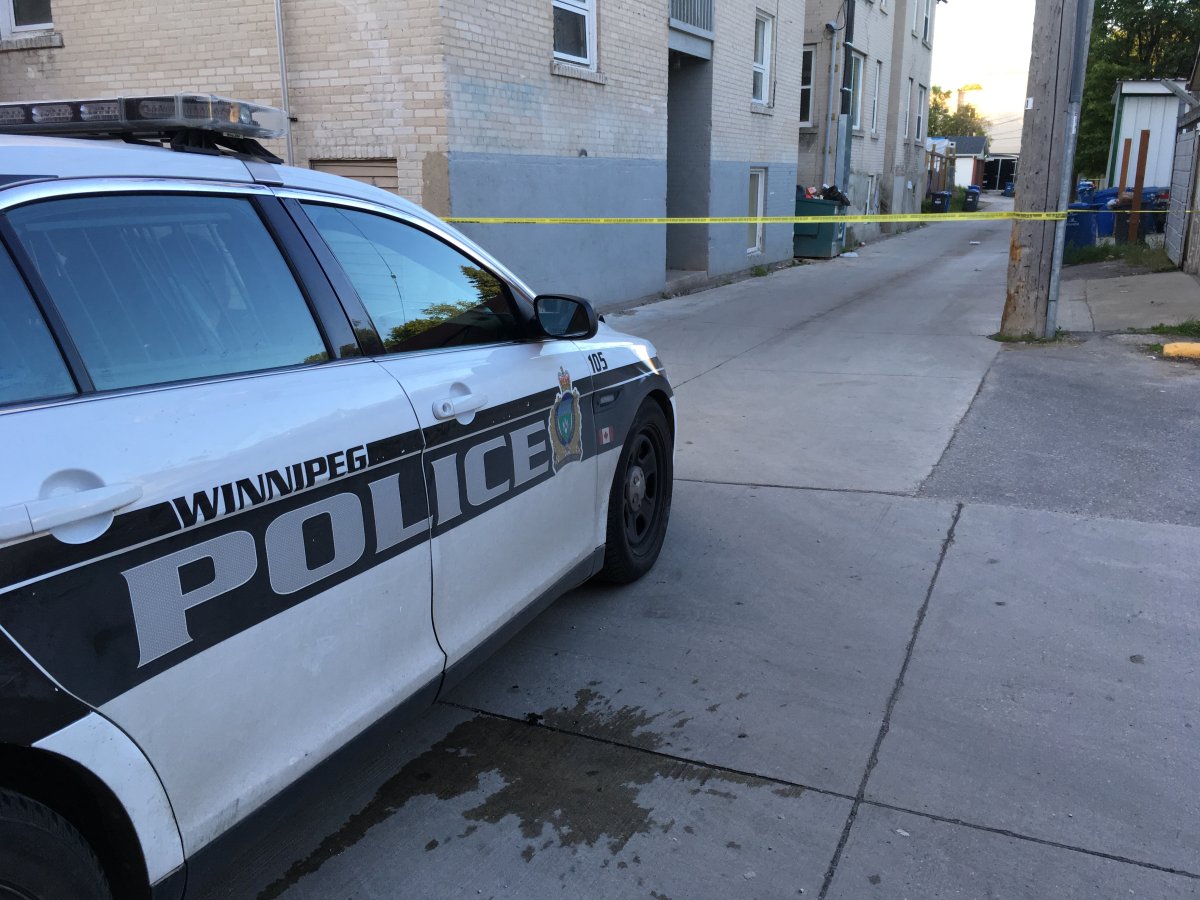 Winnipeg police have arrested a man in connection to Sunday's shooting in a back lane.