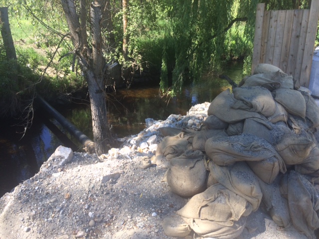 Sandbags along a Lumby creek are no longer needed. 