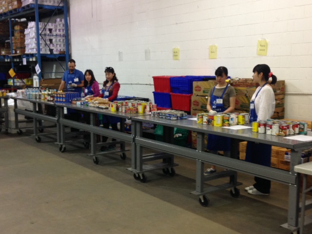 Volunteers staff are seen at the Surrey Food Bank's 135 Street facility.