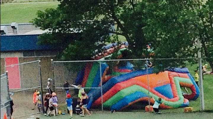 A parent told Global News that several students suffered minor injuries when an inflatable obstacle course flipped at about 11 a.m. at Victoria School for the Arts.
