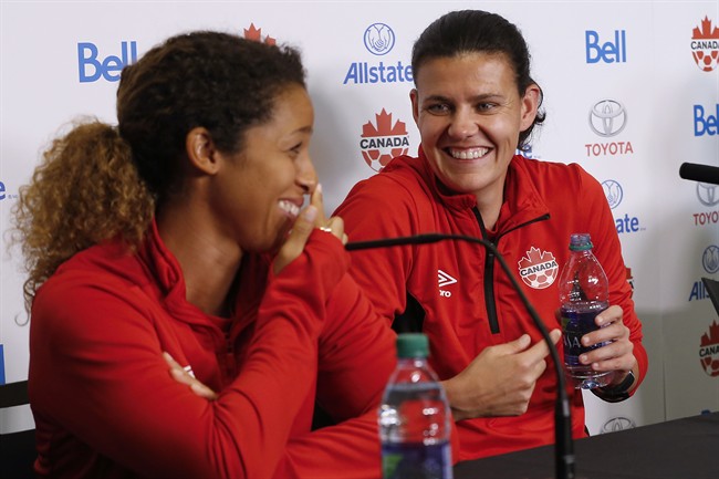 Team Canada soccer players Desiree Scott and Christine Sinclair joke around during a press conference in Winnipeg, Tuesday, June 6, 2017 prior to their match against Costa Rica on Thursday. 