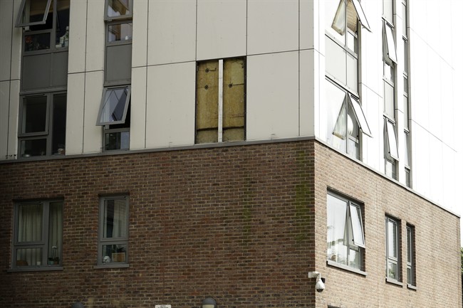 A view of part of the Burnham residential tower on the Chalcots Estate showing the bottom section of the building after cladding was removed, in the borough of Camden, north London, Thursday, June 22, 2017.