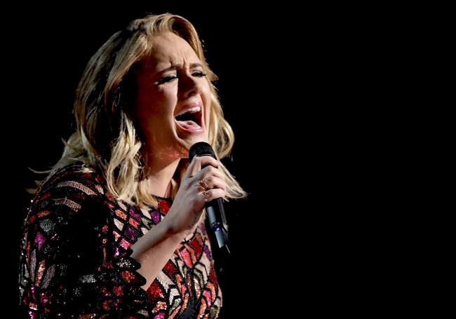 In this Feb. 12, 2017, file photo, Adele performs "Hello" at the 59th annual Grammy Awards in Los Angeles.