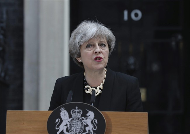 Britain’s Prime Minister Theresa May makes a statement in Downing Street, London.
