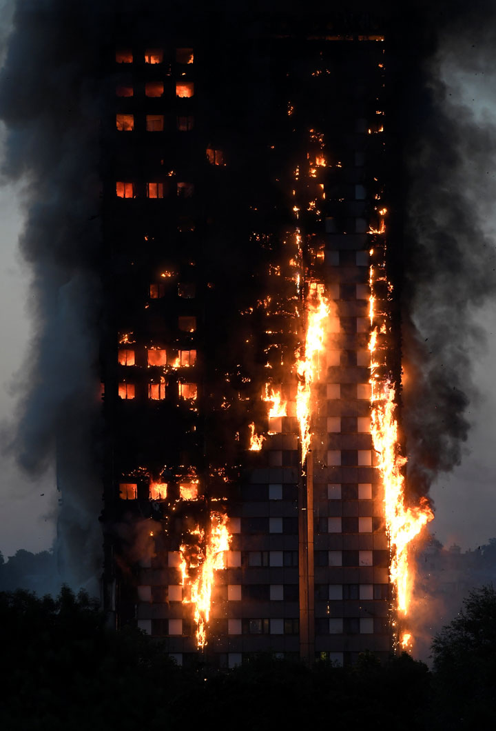 Flames and smoke engulf a tower block
