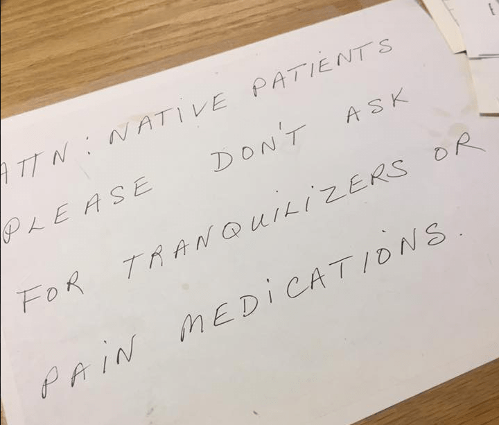 A New Brunswick First Nation is seeking an apology after a doctor's office posted a note asking aboriginals not to request tranquilizers or pain medications.