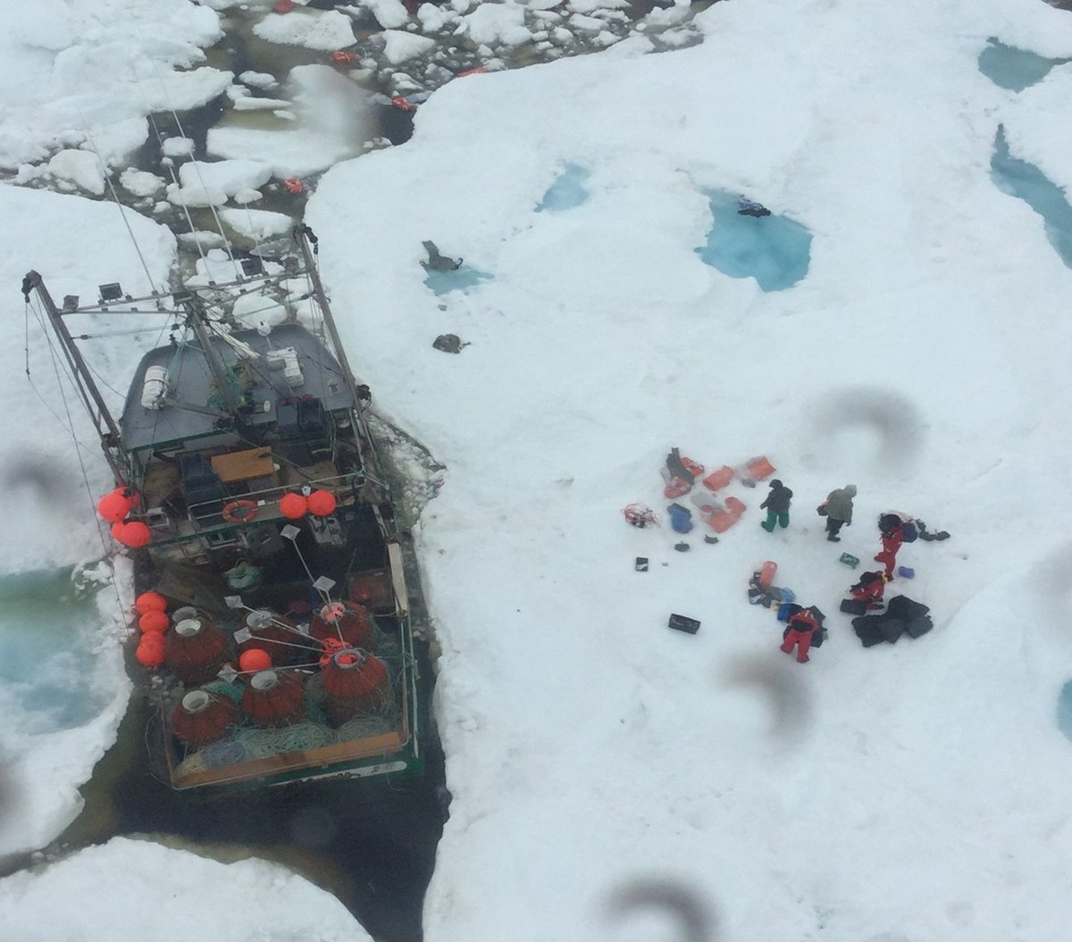 Fisherman were forced to be airlifted to safety after their boat began talking on water off the coast of Newfoundland.