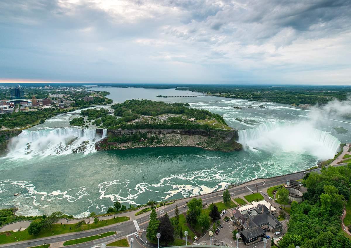 A general view of the Niagara River as it flows into the American Falls (L) in Niagara Falls, USA, and Horseshoe Falls (R) in Niagara Falls, Canada.