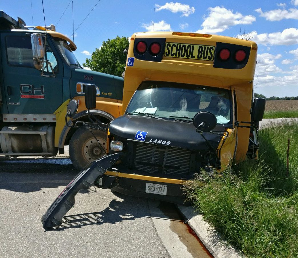 No serious injuries reported in three-vehicle crash involving school bus east of London - image
