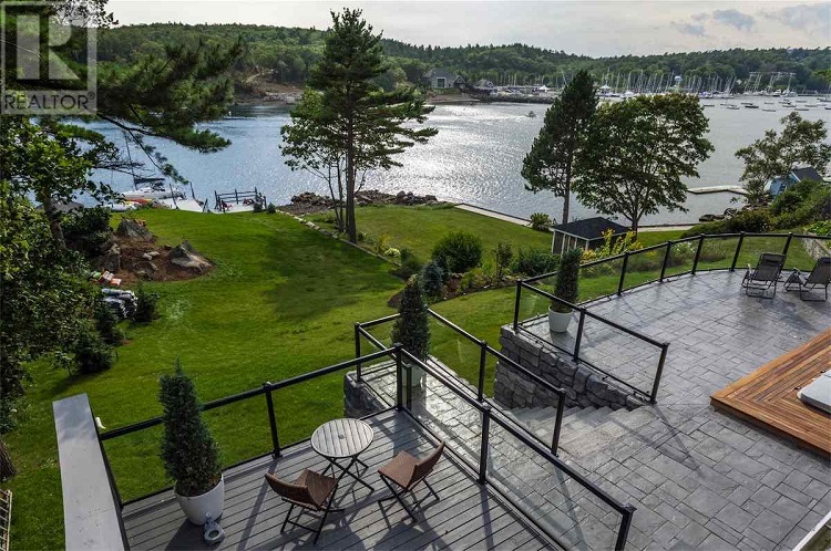 This Halifax home features a hot tub and in-ground pool.