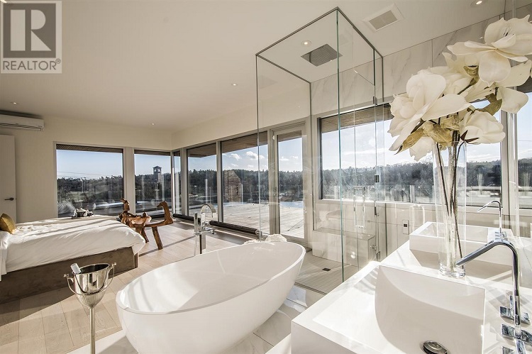 The five bedroom home features a open design master bedroom and bathroom.