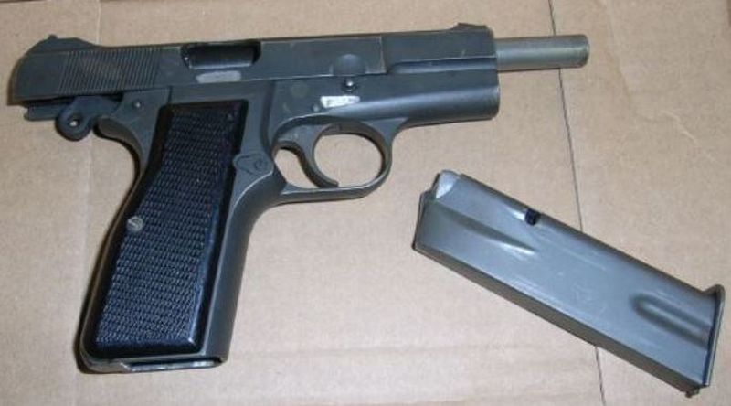 Firearm allegedly seized during execution of search warrant.