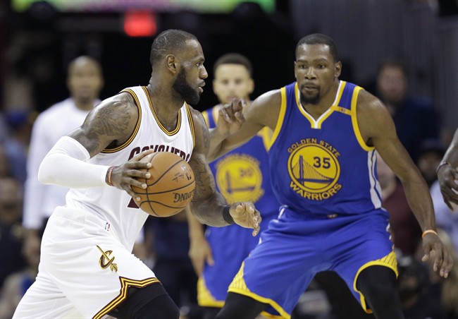 Cleveland Cavaliers forward LeBron James (23) drives on Golden State Warriors forward Kevin Durant (35) during the second half of Game 4 of basketball's NBA Finals in Cleveland, Friday, June 9, 2017.
