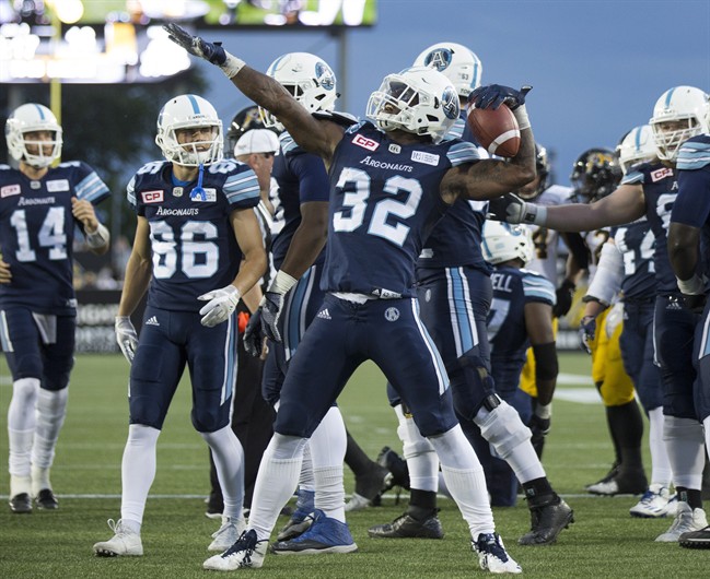 Toronto Argonauts running back James Wilder Jr. (32) celebrates his touchdown against the Hamilton Tiger-Cats, in Hamilton on Friday, June 16, 2017.