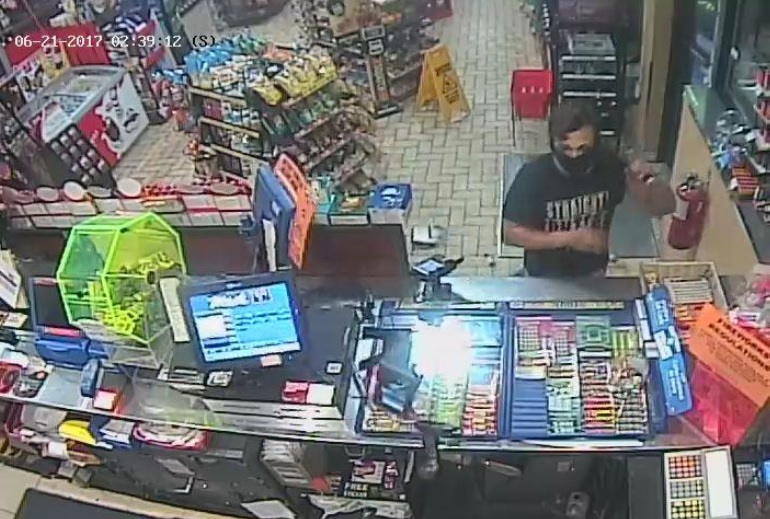 Strathroy police look for suspects after convenience store robbed with baseball bat - image