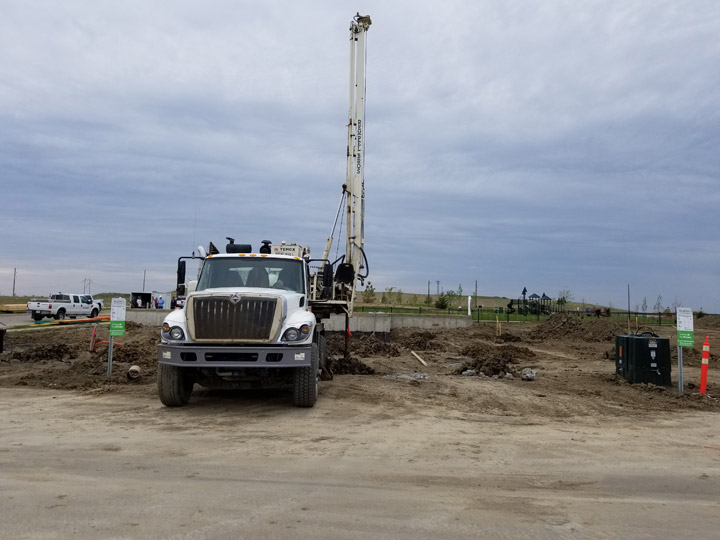 Auger truck hits natural gas line in Brighton neighbourhood forcing the evacuation of four homes.