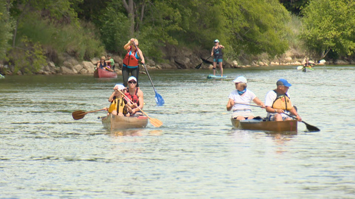 A flotilla of human powered vessels protest proposed plan to build motorized boat launch in Saskatoon’s Victoria Park.