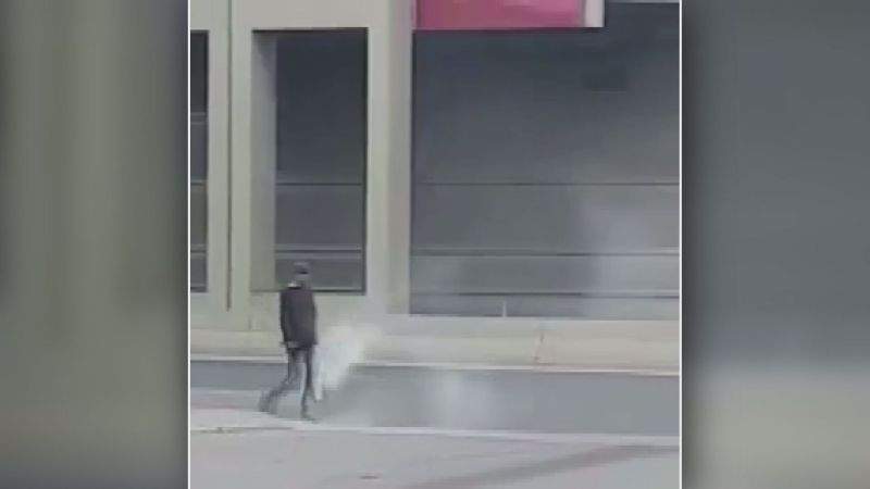 CCTV footage shows a man walking with a smoking bag near the 600 block of 36 Street N.E. on Wednesday, June 28, 2017.