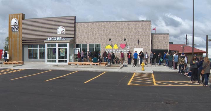 Saskatoon police were present for crowd and traffic control as Taco Bell welcomed patrons on Thursday.