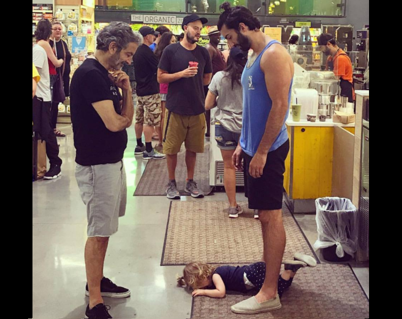 Actor Justin Baldoni,  and his father watching Baldoni's daughter having a temper tantrum in a grocery store.