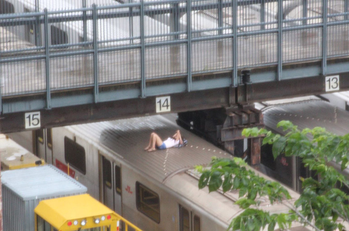 A 13-year-old girl has been arrested after entering TTC property and laying on top of a parked subway train car at the Davisville yard. The incident was captured in pictures posted on Twitter.