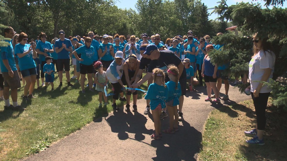 Hundreds take part in a walk raising money for colon cancer program in Edmonton.