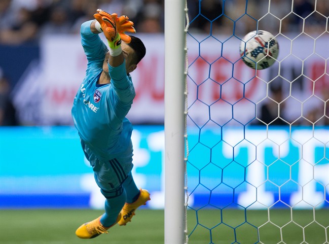 FC Dallas goalkeeper Jesse Gonzalez allows a goal to Vancouver Whitecaps' Cristian Techera during the second half of an MLS soccer game in Vancouver on Saturday, June 17, 2017.