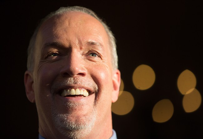 British Columbia’s then-Premier-designate, NDP Leader John Horgan, smiles while speaking outside Government House after meeting with Lt-Gov. Judith Guichon in Victoria, B.C., on Thursday, June 29, 2017. THE CANADIAN PRESS/Darryl Dyck