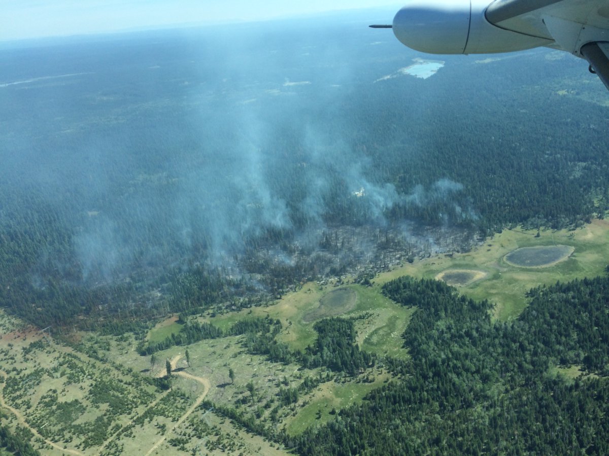 A wildfire burning 40 km southwest of Lac La Hache