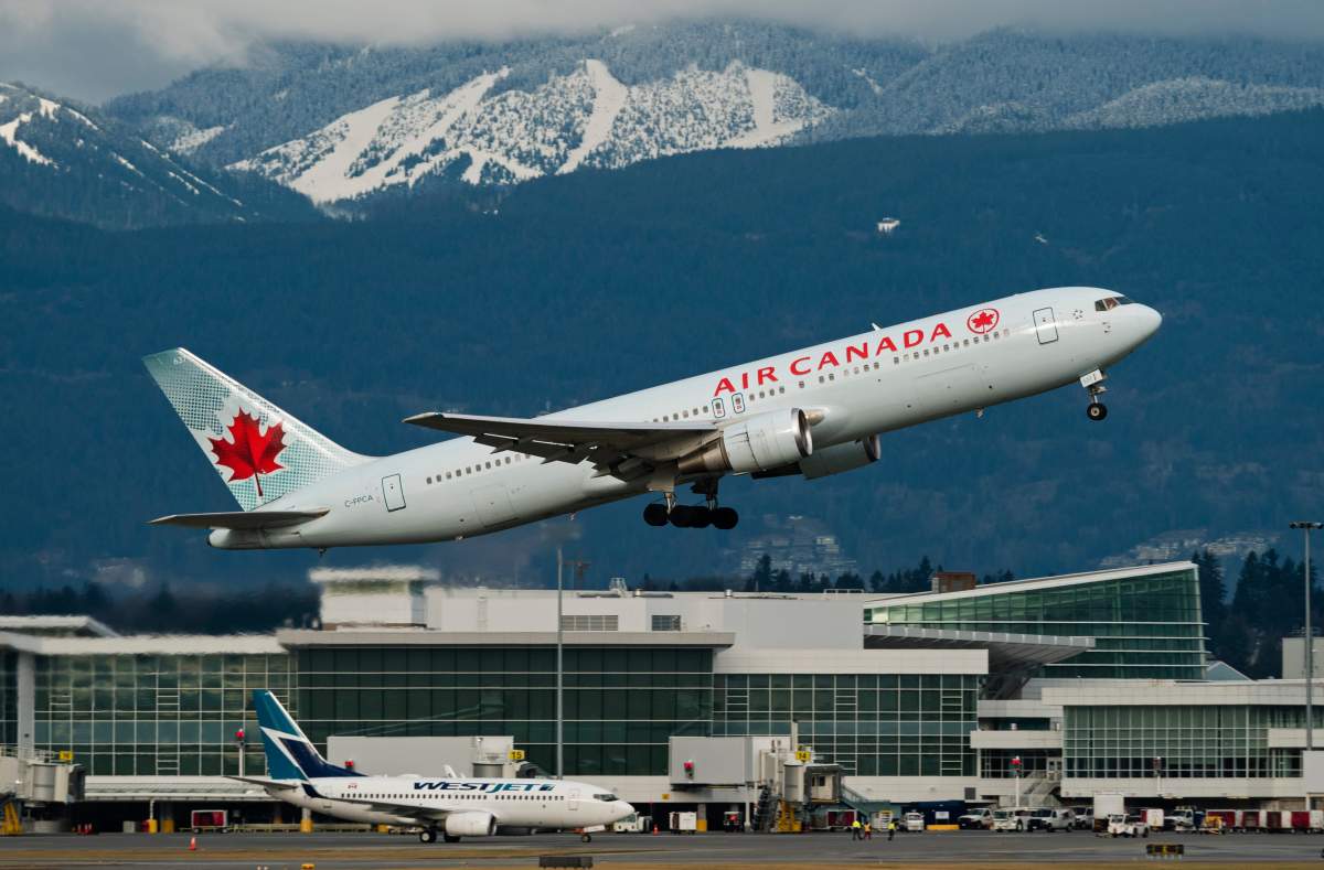 An Air Canada Boeing 767 (767-300ER) wide-body airliner takes off from Vancouver International Airport, Richmond, B.C., January 21, 2017.