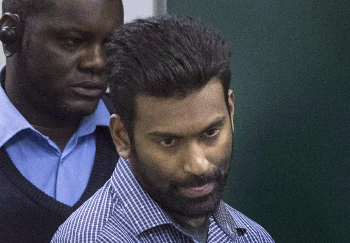 Sivaloganathan Thanabalasingam arrives for a detention review at the Immigration and Refugee Board of Canada in Montreal, Thursday, April 13, 2017. The first murder suspect in Quebec to be set free after the length of his criminal proceedings exceeded the legal limit told immigration and refugee authorities Thursday he wants to be deported back to Sri Lanka.