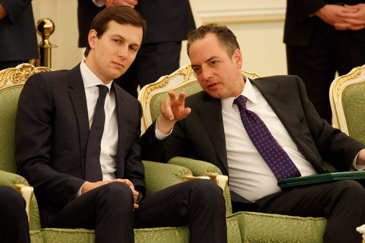 White House senior adviser Jared Kushner, left, talks with White House chief of staff Reince Priebus during a signing ceremony between President Donald Trump and Saudi King Salam, at the Royal Court Palace, Saturday, May 20, 2017, in Riyadh.