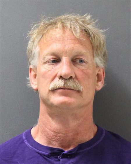 In this photo released by the Yavapai County Sheriff’s Office shows suspect Gene Alan Carpenter, 54, is seen in this photo released by the Yavapai County Sheriff’s Office.