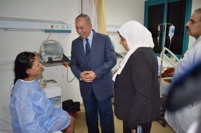 An unidentified injured tourist (L) is spoken to by the Governor of the Red Sea Region, Ahmed Abdullah, Hurghada, Egypt, July 17, 2017. 

