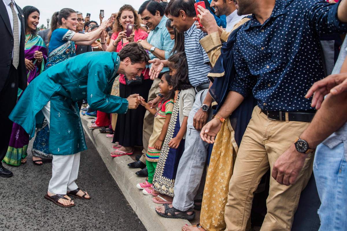 Prime Minister Justin Trudeau greets people as he visits the BAPS Shri Swaminarayan Mandir to celebrate the 10th anniversary of the Hindu temple in Mississauga, Ont., on July 22, 2017.