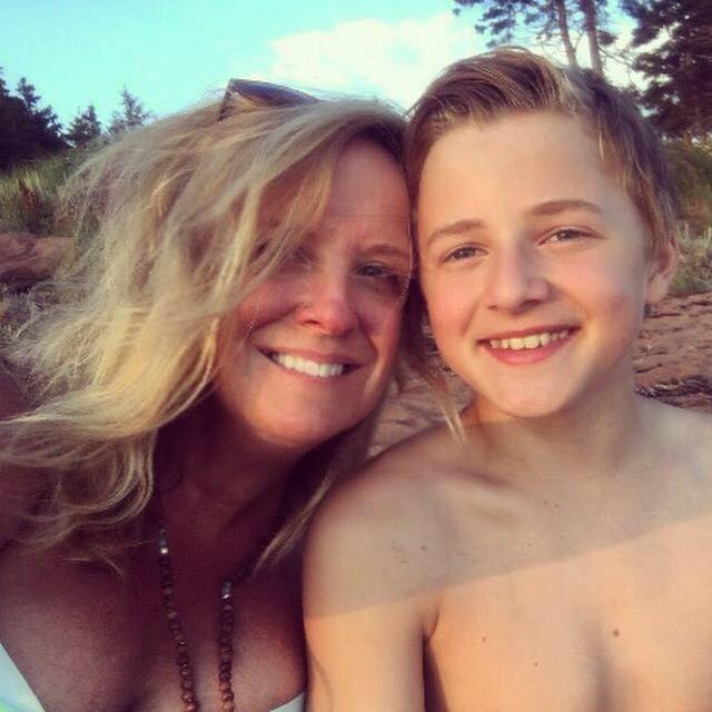 Beth Johnston, left, and her son Charlie Ross smile for a photo. The pair were caught in a rip current near Savage Harbour, P.E.I. on Saturday, July 22, 2017.