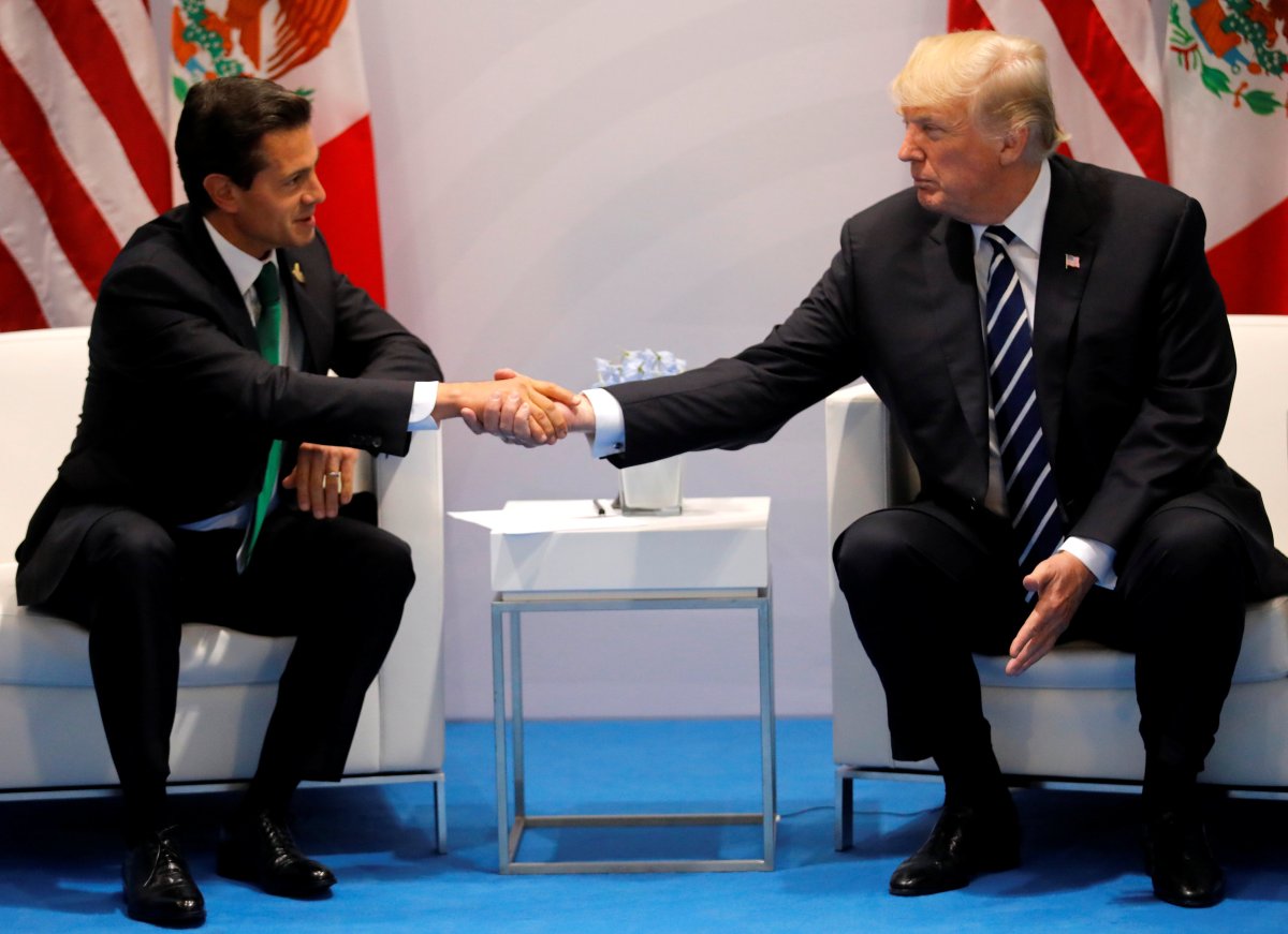 U.S. President Donald Trump shakes hands with Mexico's President Enrique Pena Nieto during the their bilateral meeting at the G20 summit in Hamburg.