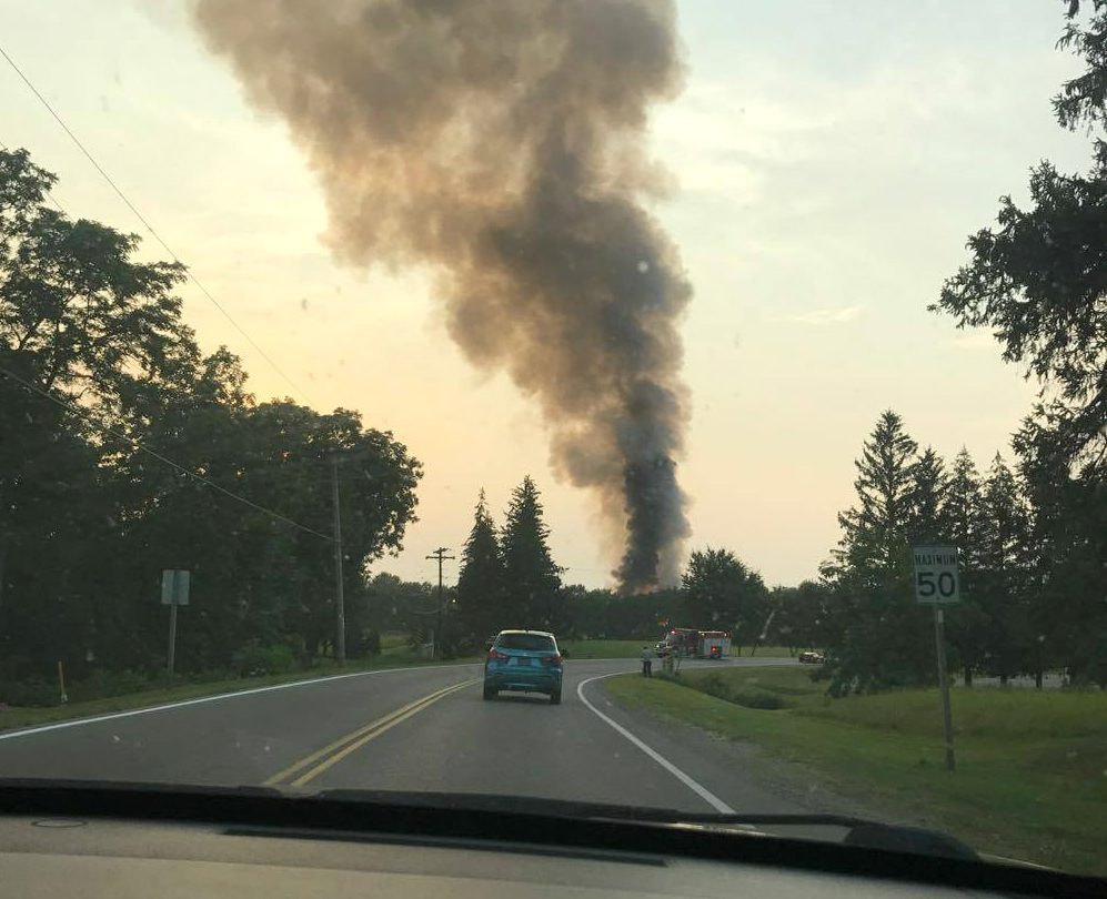 Thick smoke rising from the fire as seen from Gideon Drive.