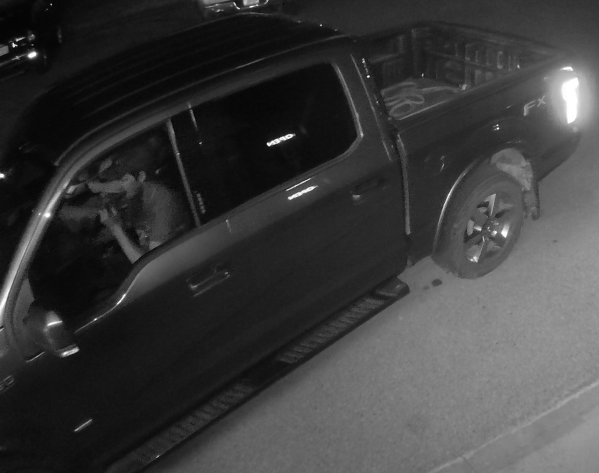 Photo from Red Deer RCMP showing a man driving a Ford truck suspected of being used in the theft on Monday, July 3.
