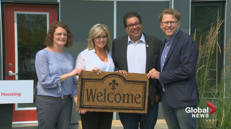 Sarah Woodgate, Sandra Jansen, Naheed Nenshi and Gian-Carlo Carra at the official opening of a new affordable housing development in Bridgeland on Wednesday, July 19, 2017.