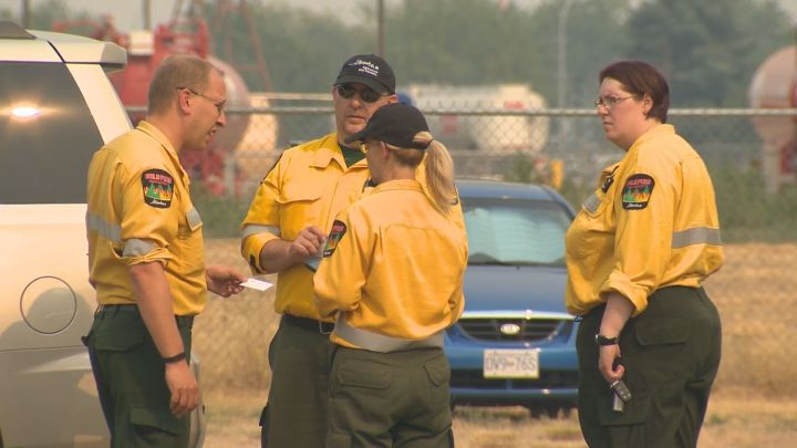 The first Alberta crews called in to help B.C. battle a ballooning number of wildfires arrived in Canada's westernmost province Monday.