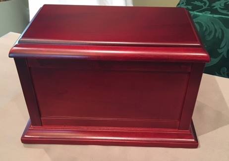 The ashes of 90-year-old Strathcona County woman Mary Myers were in this wood box when they were stolen. 
